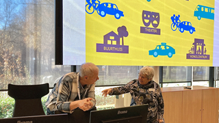 Fons-met-bezoekster-Mobiliteit-=-Meedoen-(web)